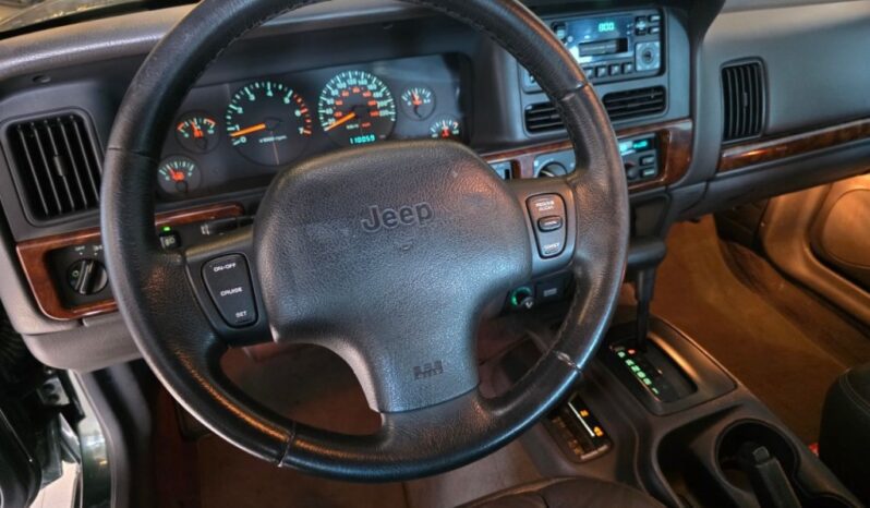 
								JEEP GRAND CHEROKEE 5.2 LIMITED 4X4 V8 16V GASOLINA 4P AUTOMÁTICO full									